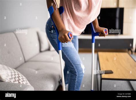 Girl Walking Crutches Hi Res Stock Photography And Images Alamy
