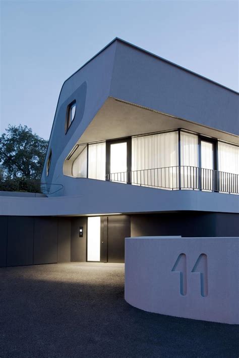 Reinforced Concrete House With Aluminum Facade