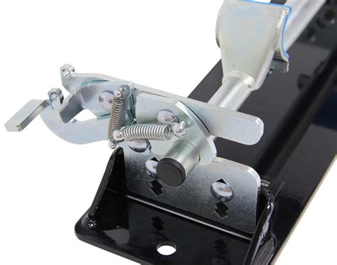Lower the trailer ramp and, with the help of a friend, push the motorcycle up and into the trailer until the front wheel rests against the wheel chock. B&W Biker Bar Motorcycle Tie-Down System for Trailers ...
