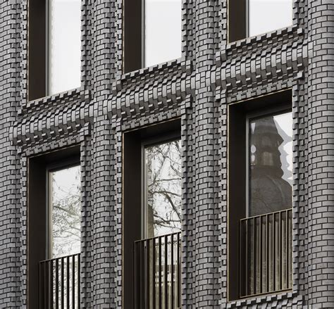 Bureau De Change Unveils Five Story Building With Undulating Brick Facade