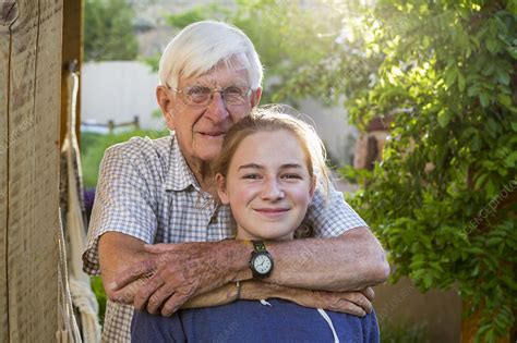 A Young Teenage Girl And Her Grandfather Stock Image F0323004