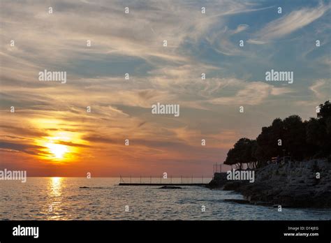 Rocky Croatian Beach In The Area Of Solaris Resort At Sunset Adriatic