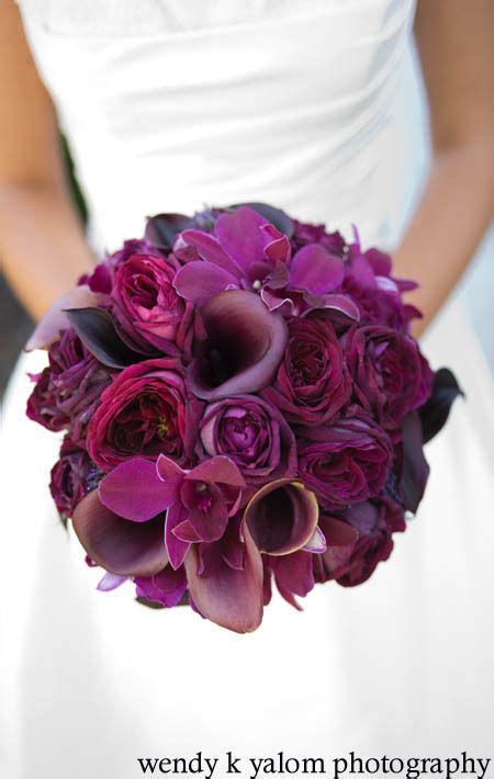 All weddings should be elegant, magical, and something out of a fairy tale. Different shades of purple flower. Beautiful bouquet ...