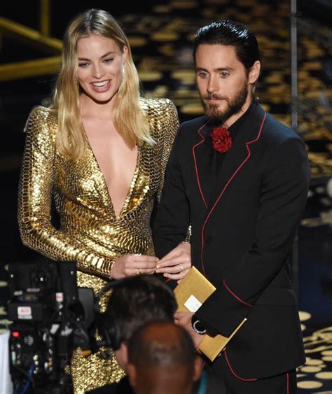 Margot Robbie L And Jared Leto Speak Onstage During The 88th Annual