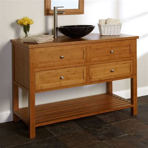 One popular option that looks good with bamboo styles is a vessel sink, especially when made of hammered metal or glass. bamboo vanity - Google Search | Vanity, Bathroom furniture, Wood vanity
