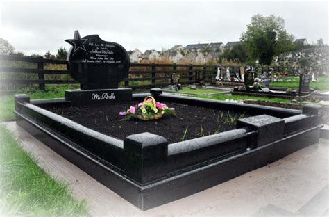 Headstone Surrounds Gravestones