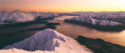 Pre Sunrise Glow Over Lake Wanaka From Roys Peak In Otago In The South