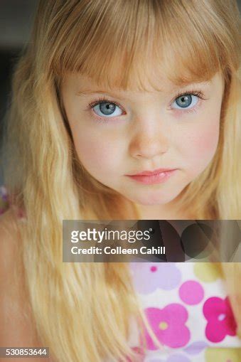 Portrait Of A Girl With Long Blond Hair And Blue Eyes Troutdale Oregon