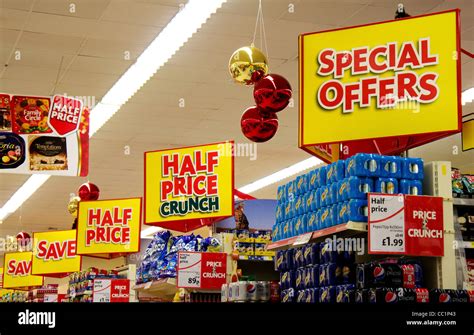 special offers signs in a Morrisons store, uk Stock Photo - Alamy