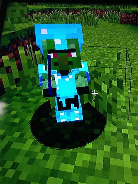 This Baby Zombie Villiger Is Decked Out Xd Baby Zombie Minecraft Games