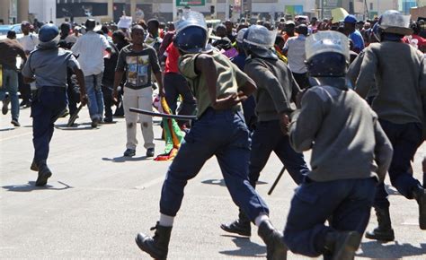 Zimbabwe Harare Cops Beat Up Arrest Journalists