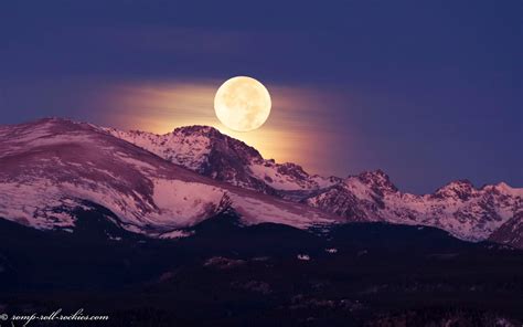 Romping And Rolling In The Rockies Full Moon Setting Over Snowy