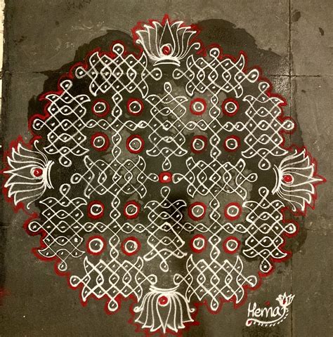 A Painting On The Side Of A Building With Red And White Designs Painted