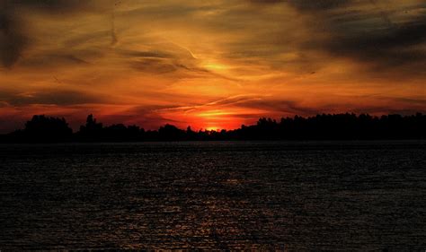 Sunset Over Lake Henry Photograph By Caroline Violett Fine Art America
