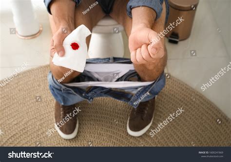 Man Holding Toilet Paper Blood Stain Stock Photo 1600241869 Shutterstock