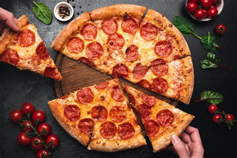 Dominos Pizza Boosts Its Dividend By 20 The Motley Fool