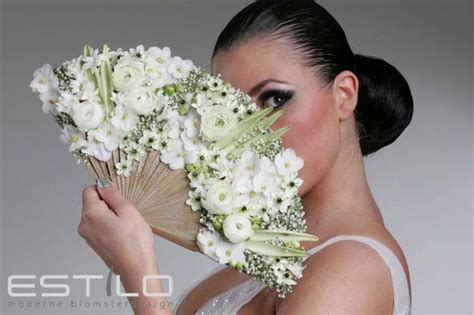 Bouquets for wedding at summerour studio in atlanta, georgia. Fresh flowers attached to fan for a unique choice in ...