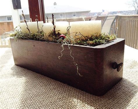 After a few cold winter months, it's about time we spent some time outdoors enjoying the nice spring breeze and fresh vegetation and know just the project that can give you a boost in the right direction: Repurposed Sew Drawer into a Spring Center Piece on Etsy ...