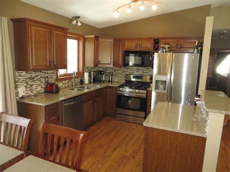 Typically, the main level contains the living areas: Gorgeous kitchen in split entry home for sale in Ramsey ...