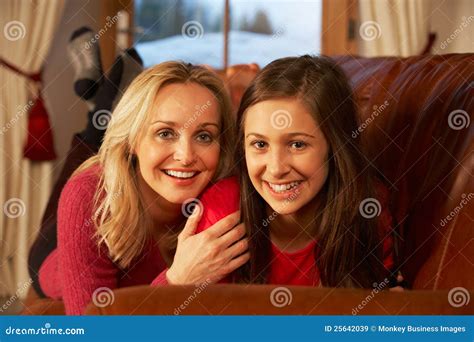 Portrait Of Mother And Daughter On Sofa Together Stock Image Image Of Middle Indoors 25642039