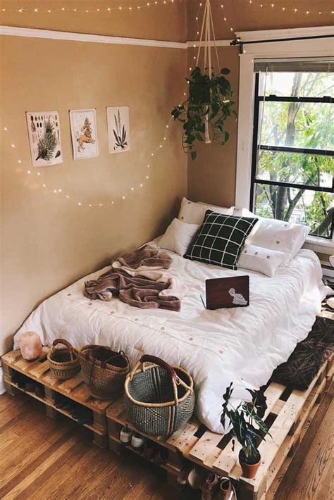 A luxurious primary bedroom with elegant walls and fine carpet flooring lighted by scattered recessed ceiling lights. 27 Cozy Decor Ideas With Bedroom String Lights
