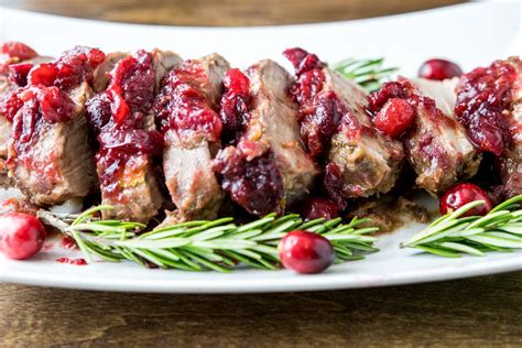 Spoon the cranberry mixture over roast. Slow Cooker Cranberry Rosemary Pork Tenderloin | Recipe ...