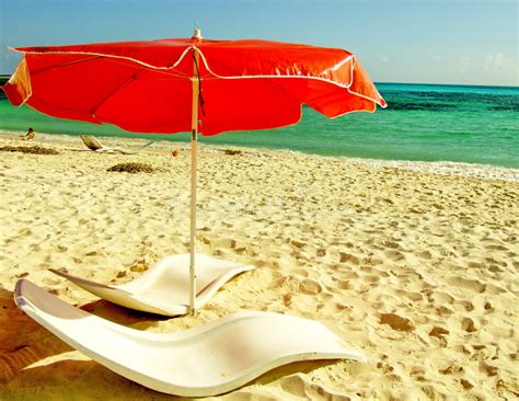 Red Beach Umbrella stock photo. Image of island, edge - 4683406
