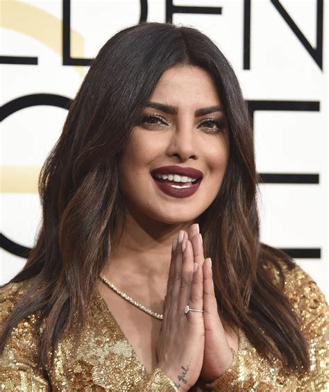 Priyanka Chopra Sexy Cleavage Show At The 74th Annual Golden Globe Awards At The Beverly Hilton