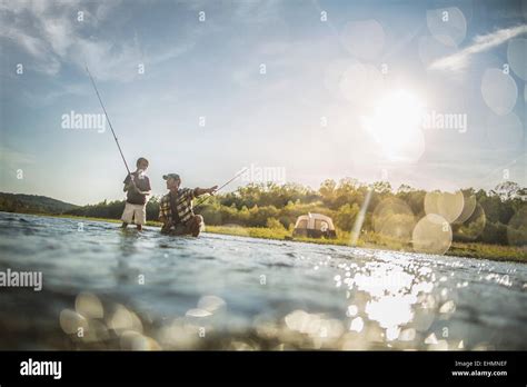 Boy Fishing In River Hi Res Stock Photography And Images Alamy
