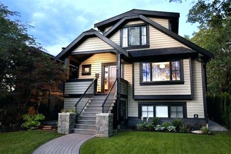 The design team painted the brick exterior white to unify the finishes, adding black trim for a. grey house exterior with black trim - Google Search ...