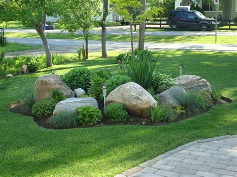 Flagstone and river rock were used to create this walkway. Easy Ideas for Landscaping with Rocks