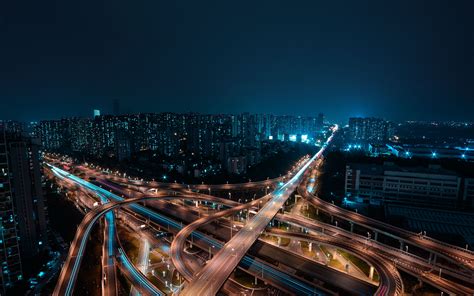 Download Wallpaper 3840x2400 Night City Aerial View Roads Buildings