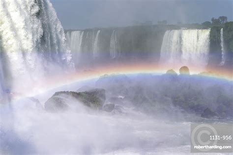 Rainbow Over The Iguazu Falls Stock Photo