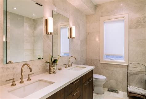 Find an average eye level for everyone using the mirrors, and make sure this height is. Typical Height of Bathroom Vanity Lights | Hunker