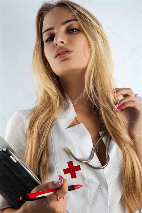 Sensual Long Hair Blonde Nurse In White Gown Stock Photo By Ponomarencko