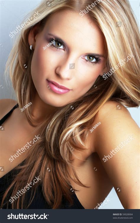 Portrait Of Pretty Young Woman Stock Photo 59028904