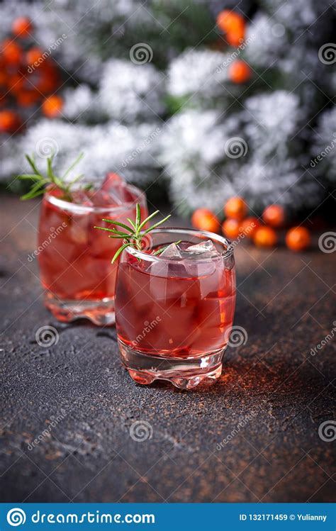 By sarah stiefvater | nov. Christmas Cranberry Drink With Rosemary Stock Image ...