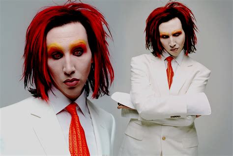 Badly dyed hair marilyn manson shirt jelly bracelets plaid pants black messenger bag with a. Marilyn Manson Quotes