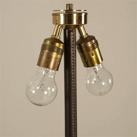 Contemporary floor lamps come in a wide variety of finishes and it is not just the talk, dark and seemingly scandinavian style floor lamp that fits the billing. Pair Minimal Floor Lamps with Leather Stem and Cream Shade ...