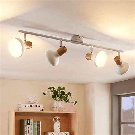 It is designed to break the boundaries of traditional ceiling lighting with its geometric shape. Linear ceiling light Fridolin, four-bulb | Lights.co.uk