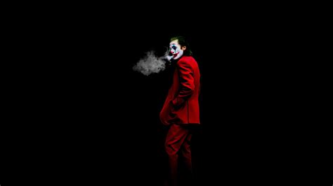 Joker Is Wearing Red Dress Smoking In Black Background Hd Joker