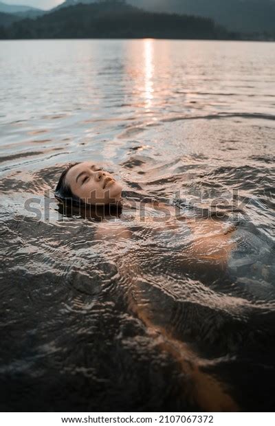 Asian Woman Relaxing Lake Water Floating Stock Photo 2107067372