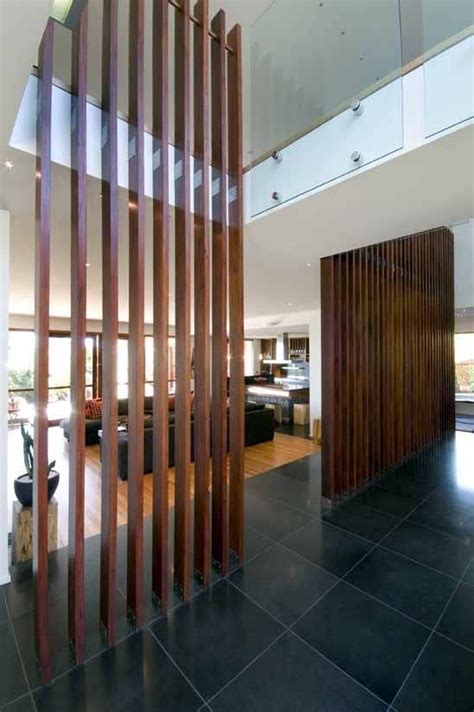 Modern home partition wall decor design ideas, room divider design ideas, living room partition wall design, kitchen dining room partition design, wooden partition wall designs thanks for watching. vertical wood room divider in foyer - Google Search ...