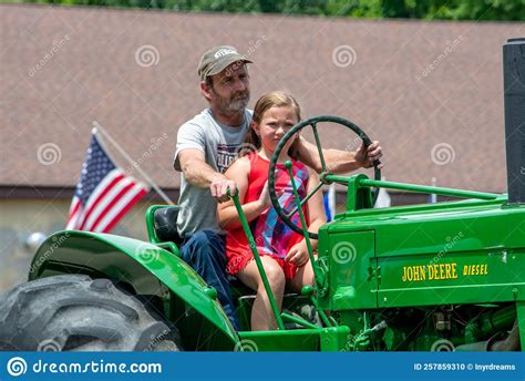 Riding With Dad In A Parade Editorial Image Image Of America Green 257859310