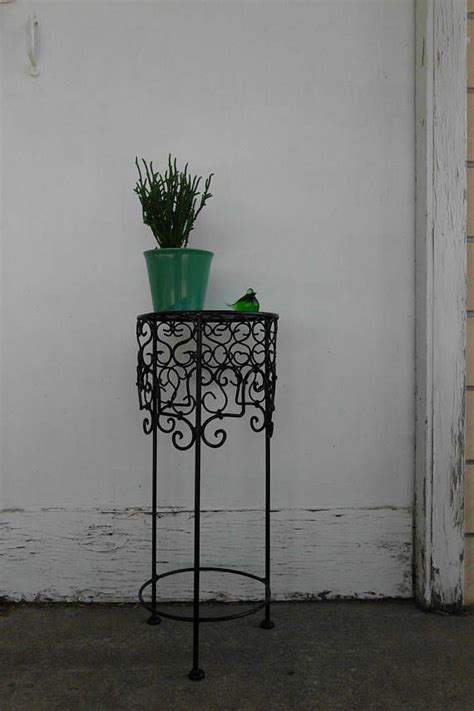 Plants garden beds lined baskets macrame plant hangers novelty planter holders novelty planters patio accent tables plant support cages planter boxes planter brackets planter. Small Black Wrought Iron Plant Stand | Wrought iron plant ...