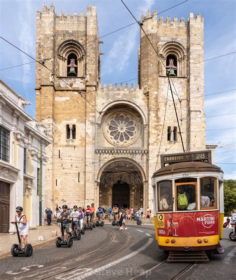 Trolley Or Tram On Famous Route 28 In Alfama District Of Lisbon