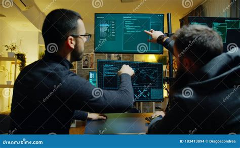 Team Of Cyber Criminals Hacking Into The Government Server Stock Photo