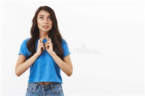 Nervous Girl Biting Fingers And Looking Aside With Anxious Panicking