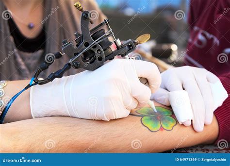 Tattooer Showing Process Of Making A Tattoo Stock Image Image Of