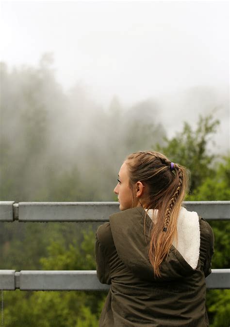 Teenage Girl Admiring A Beautiful Foggy View Porcarolyn Lagattuta